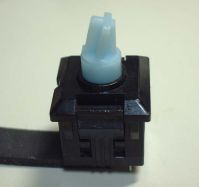 Side view; note the ribs on the retention clips that appear to be unique to the NEC switch
