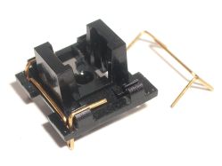 The conductive rails clip into the switch base