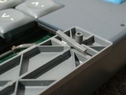 The space bar stabiliser wire hooks are moulded into the space bar keycap, and are fragile