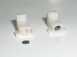 The spring rests against a rubber circle of unknown function