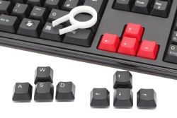Replacement keycaps and keycap puller