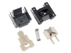 Disassembled, top views; note the small pegs that the switchplate sits on