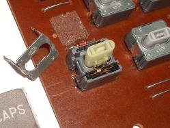 Opened; at the front of the slider is the ramp that holds the contacts apart