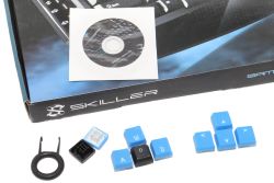 Software and driver CD, replacement keycaps, and keycap puller