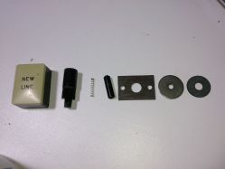 Keyswitch pieces, not including the plastic barrel, steel plate, PCB and rubber separator