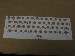 Insulating layer between the snap-action array and the PCB