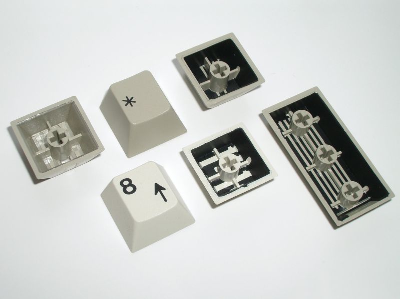 File:Cherry doubleshot keycaps -- tops and bottoms.jpg