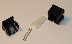 Return spring and slider