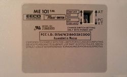 Rear label, showing branding of Maxi's former parent company EECO