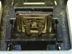 Support frame in place between the front and rear contact plates