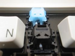 Rear view of black and cyan, showing the click arms