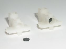 Spring recess in the slider contains a small black rubber disc