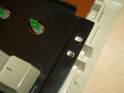 Untapped and unused plate mounting holes
