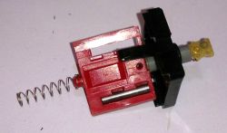 Micro Switch magnetic reed slider with magnetic contact, spring, and box housing top on Burroughs D8585