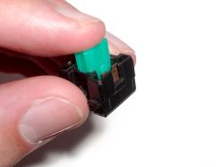 Switch opened, showing the slider in rest position