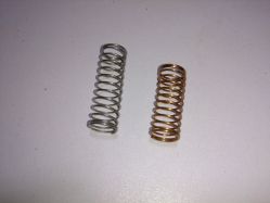 Spring comparison, longer/heavier spring is for the locking switch