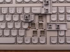 Some keycaps pulled revealing the rubber domes underneath.