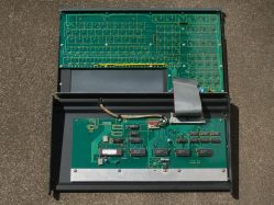 Opened, revealing the controller and switch PCBs
