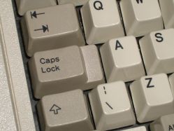 Stepped caps lock key on a Model M