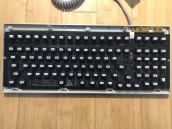 Cover removed, notice the plastic plate