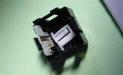 Bottom part of the case, lever laid down to show mechanism