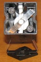 Inside of key module, showing the beam spring itself. (Propped up by fly plate)