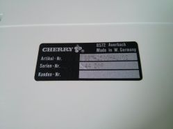 Back sticker of a Polish-language Cherry G80-2500.