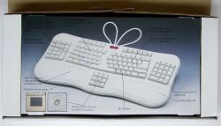 Inside; contains various product details including a depiction of the trackpad thus far not seen