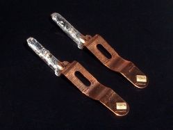 Terminals with contact prisms; notice how the 45° angles allow for duplicate parts