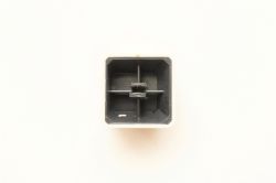 Underside of light keycap, showing double-shot moulding