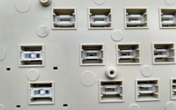 Sliders close up; note the provision for springs under certain keys
