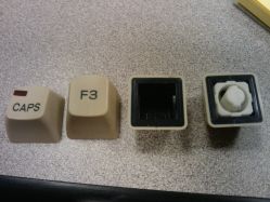3rd Generation cylindrical keycaps with and without snap-in slider.