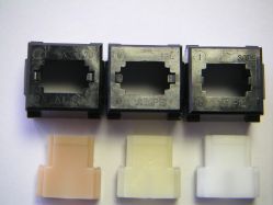 Shell comparison with salmon and early cream damped; note the newer (bold face) Alps logo and removal of the slits