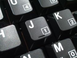 Surface coating on the pad-printed keycaps