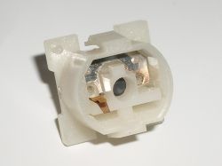 Dual contact leaves (steel and copper), which press onto small lugs