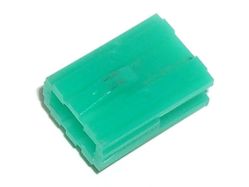 Substance on the slider, possibly dry lubricant (side facing the contacts)
