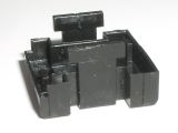 'T' pieces in the base which hold down the upper shell