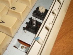 Additional spring under the space bar