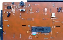 The IC reads "KME-2006" (?) and is dated 9313; the buzzer is visible