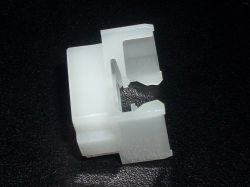 Opposite corner contact actuator ramps are different shapes
