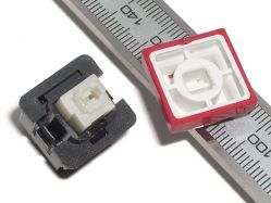 Keycap mount, demonstrated with a FANUC keycap
