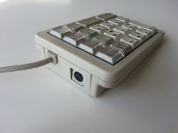 PS/2 port on back side of the keypad.
