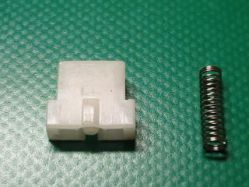 Slider and return spring