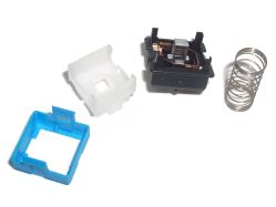 Spring removed; the upstroke damping stop can be seen on the inside of the lid