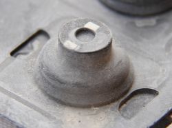 A rubber dome from the switch of a heavily used Topre keyboard.