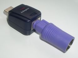 Adapter connected to a converter for using an AT keyboard with a USB-based computer