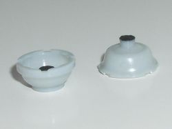Conductive dome turned inside out to demonstrate the conductive pad
