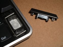 The stabiliser wire snaps into grips moulded directly into the keycap