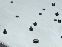 Fully inserted pins on the right, and partially inserted pins on the left